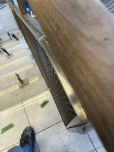 Wood and metal stair railing detail