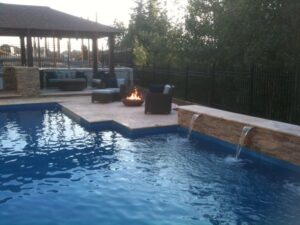 Poolside patio with fire bowl & seating