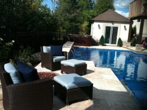Wicker patio chairs by backyard poo
